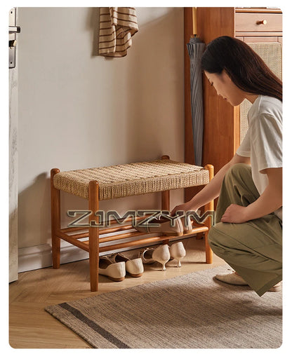 Tabouret à chaussures tissé en rotin et bois massif